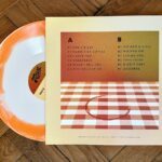 mtbrd-damn-fine-swirly-marmalade-colored-vinyl-back