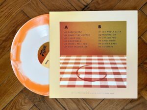mtbrd-damn-fine-swirly-marmalade-colored-vinyl-back